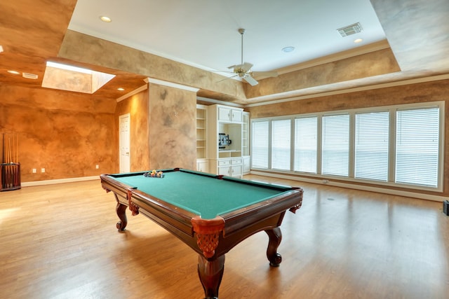 playroom with billiards, visible vents, wood finished floors, and ornamental molding