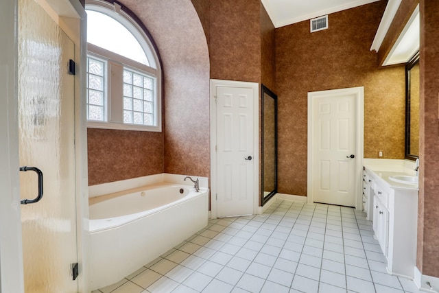 full bath featuring visible vents, wallpapered walls, vanity, tile patterned flooring, and a bath