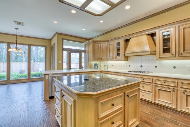 kitchen featuring tile countertops, stainless steel appliances, dark wood-style flooring, tasteful backsplash, and custom range hood