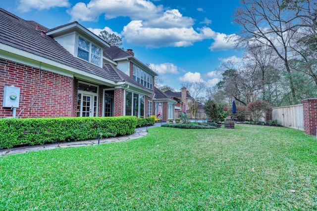 view of yard featuring fence