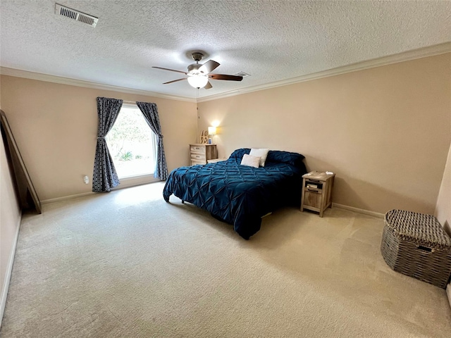 bedroom with crown molding, carpet flooring, and visible vents