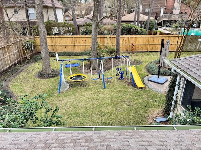 view of jungle gym with fence