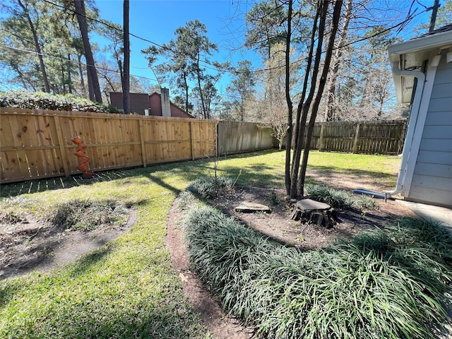 view of yard featuring a fenced backyard