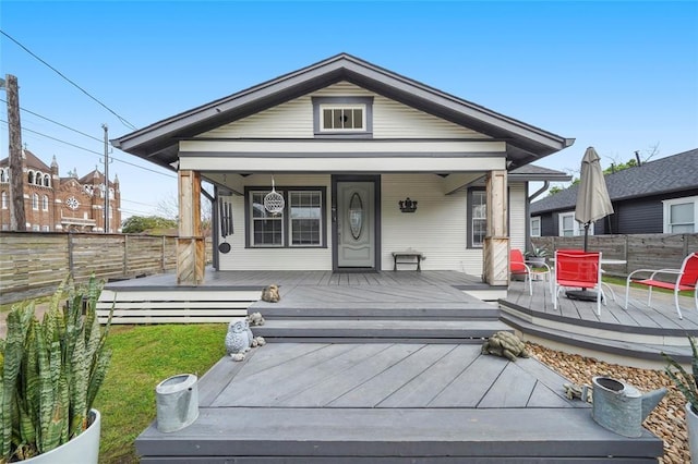 view of front of house with fence