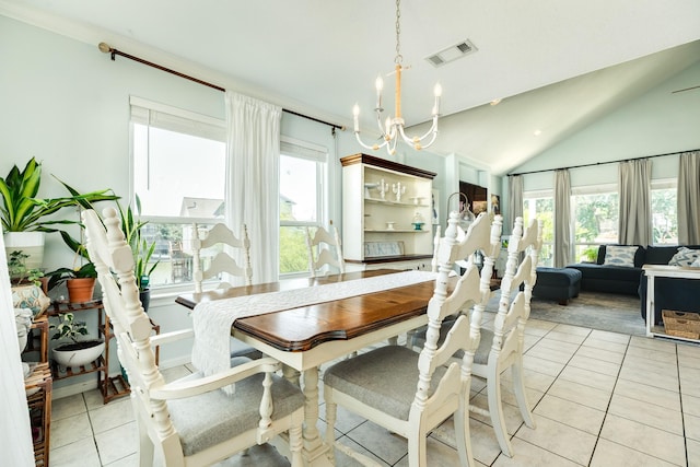 dining area featuring light tile patterned floors, a wealth of natural light, lofted ceiling, and visible vents