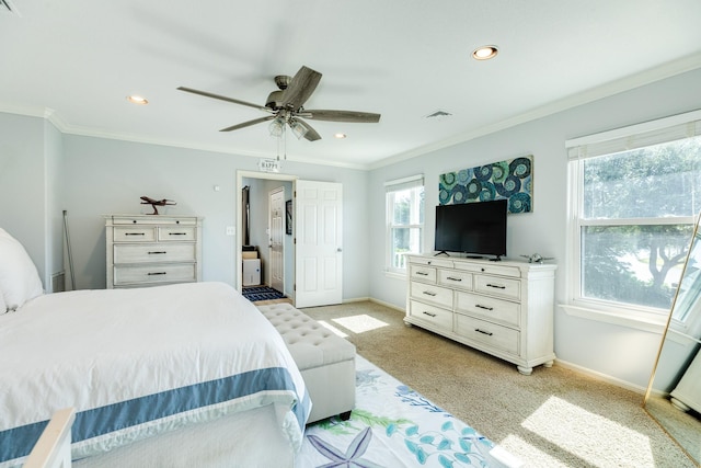 bedroom featuring ornamental molding, visible vents, and baseboards