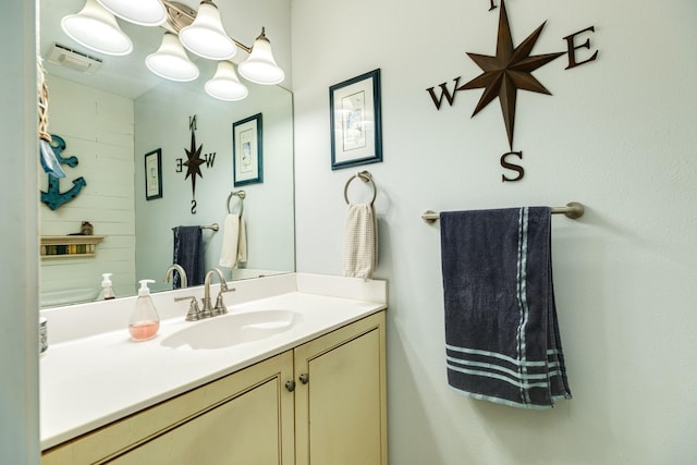 bathroom featuring visible vents and vanity