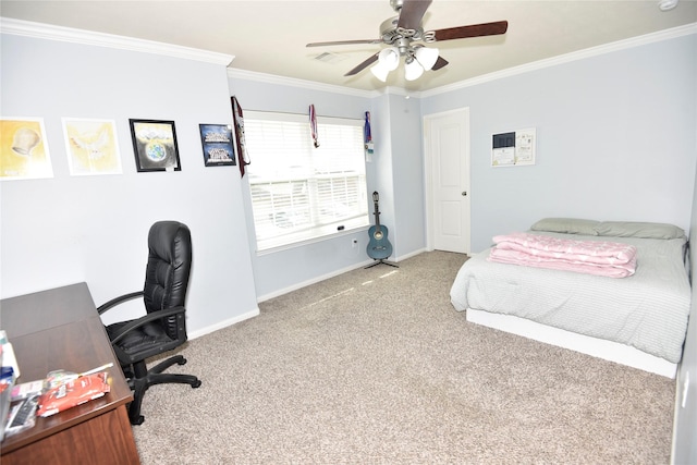 bedroom with carpet flooring, crown molding, and baseboards