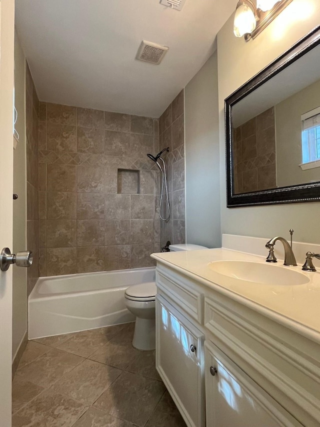 full bath featuring toilet, shower / bathtub combination, visible vents, and vanity