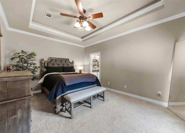 bedroom featuring carpet, a raised ceiling, visible vents, ornamental molding, and baseboards