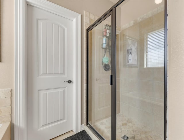 bathroom featuring a stall shower