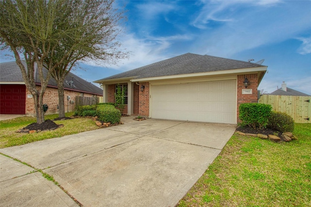 ranch-style house featuring brick siding, roof with shingles, concrete driveway, fence, and a garage