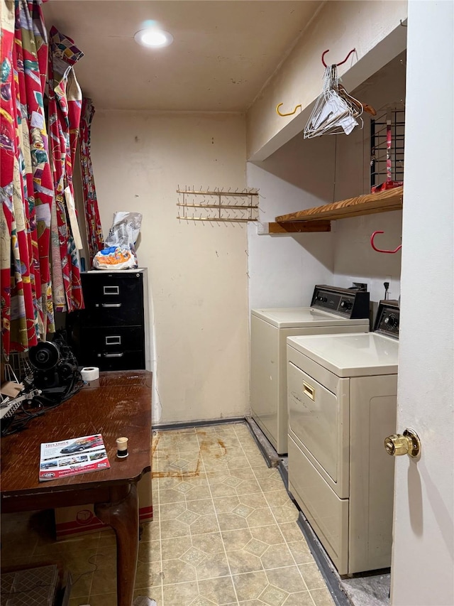 laundry room with laundry area and washer and clothes dryer