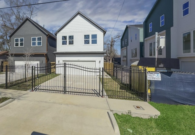 traditional home featuring driveway, a garage, and fence