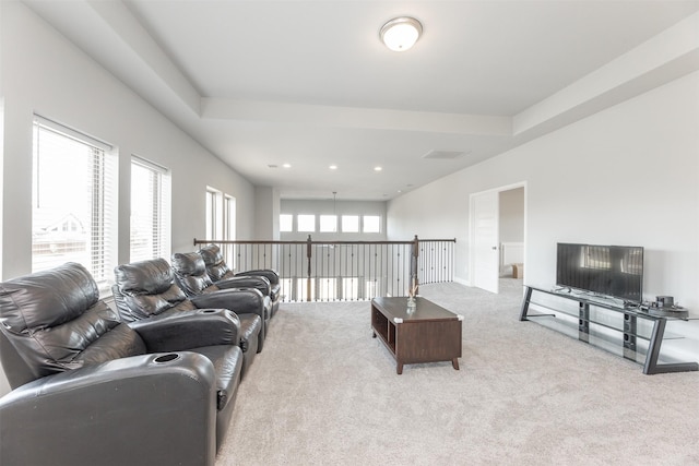 carpeted living room with recessed lighting and visible vents