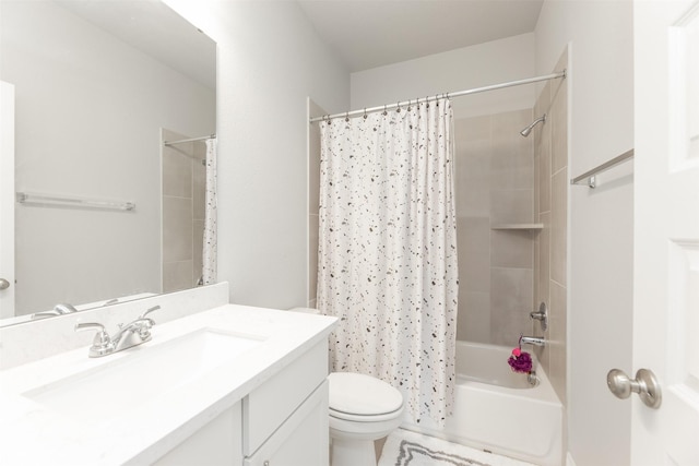 bathroom with shower / tub combo with curtain, vanity, and toilet