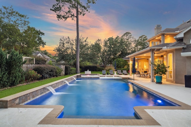 view of pool featuring a patio area, fence, and a fenced in pool