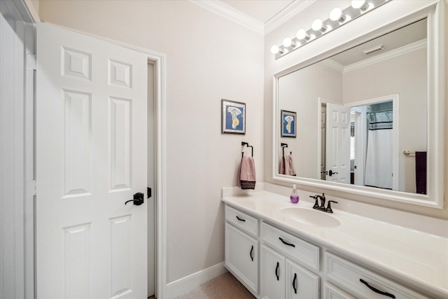 full bathroom with baseboards, vanity, visible vents, and ornamental molding