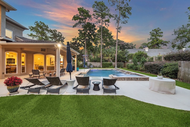 view of pool featuring a fenced backyard, a fenced in pool, a patio, and a yard