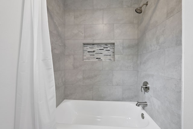 full bathroom with shower / tub combo with curtain