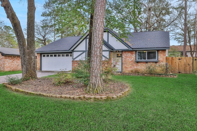 view of front of home with fence, a front lawn, concrete driveway, a garage, and brick siding