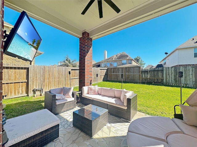 view of patio featuring an outdoor living space, a fenced backyard, and ceiling fan