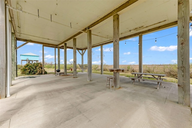 unfurnished sunroom with plenty of natural light