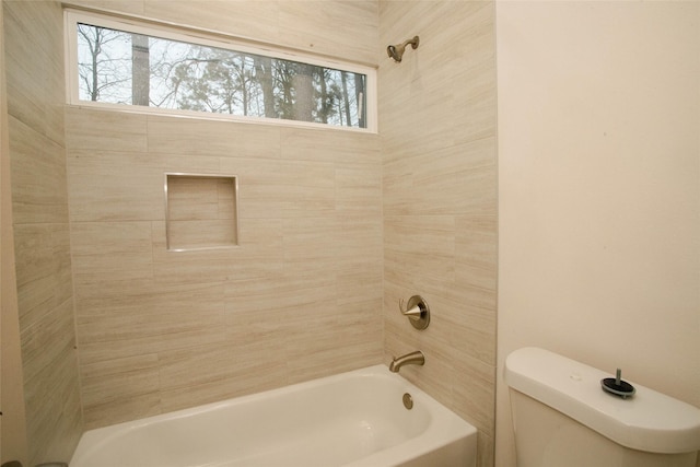 full bath featuring toilet and bathing tub / shower combination