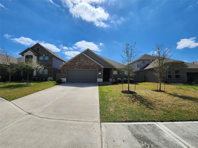 view of front of home with driveway, brick siding, a front lawn, and an attached garage