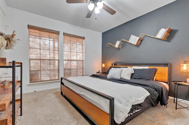 bedroom featuring baseboards, carpet, and a ceiling fan