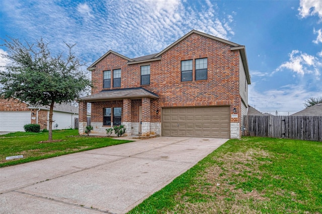 traditional home with a front yard, fence, concrete driveway, and brick siding