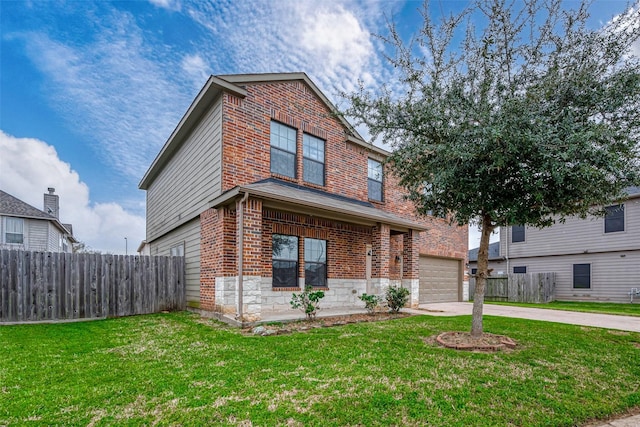 view of front of home with brick siding, concrete driveway, fence, a garage, and a front lawn