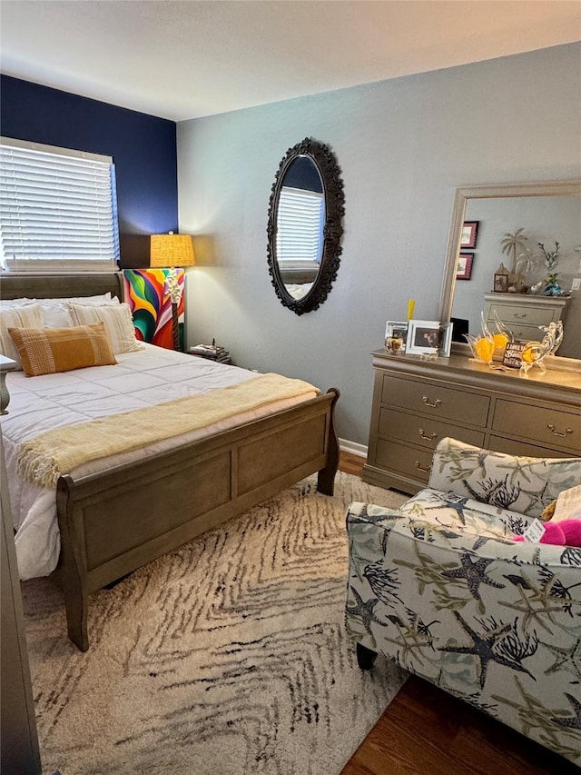 bedroom featuring wood finished floors