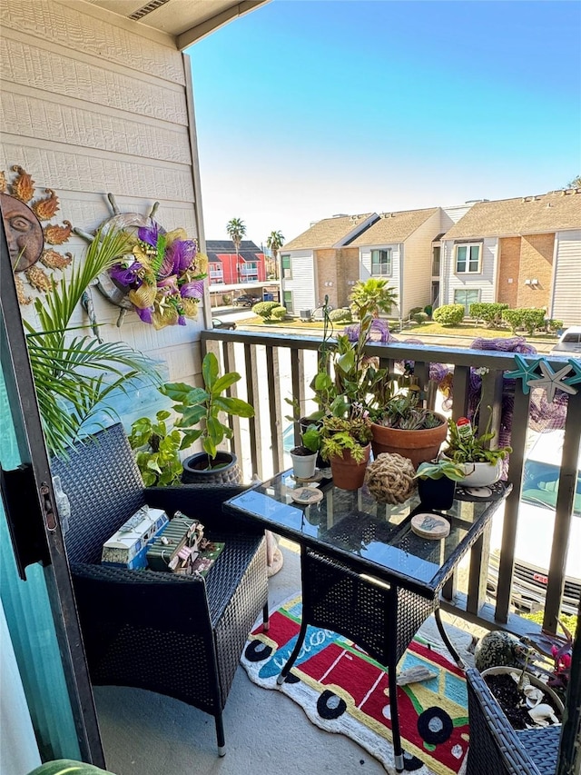 balcony featuring a residential view