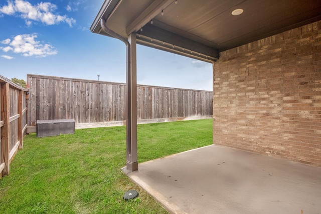 view of yard with a patio and a fenced backyard