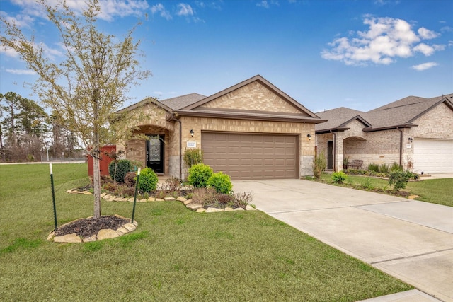 view of front of house featuring brick siding, a shingled roof, a front yard, a garage, and driveway