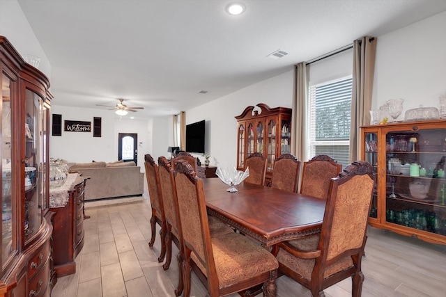 dining room featuring ceiling fan and visible vents