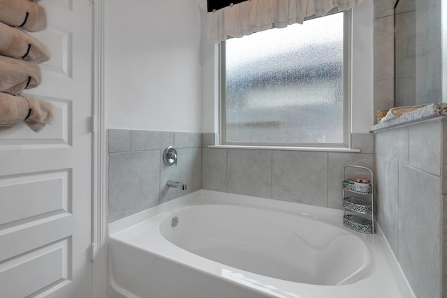 bathroom featuring a garden tub