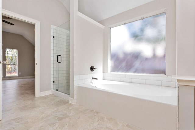 full bath with lofted ceiling, a stall shower, a ceiling fan, and a bath