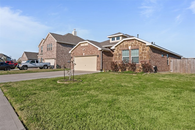 view of front facade featuring driveway, a front yard, fence, and brick siding