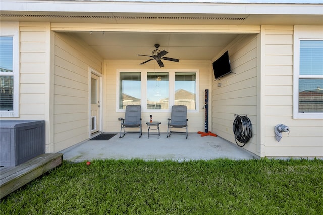 view of patio featuring ceiling fan and central air condition unit