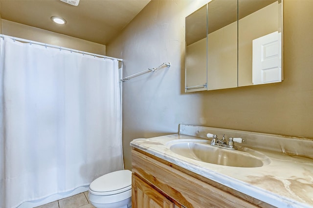 bathroom featuring toilet, tile patterned flooring, a shower with shower curtain, and vanity