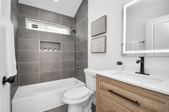 full bathroom featuring toilet, vanity, and bathing tub / shower combination