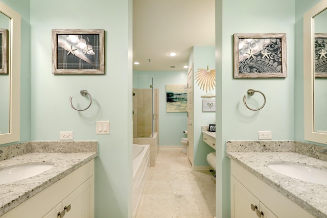 bathroom featuring an enclosed shower, toilet, two vanities, and a sink