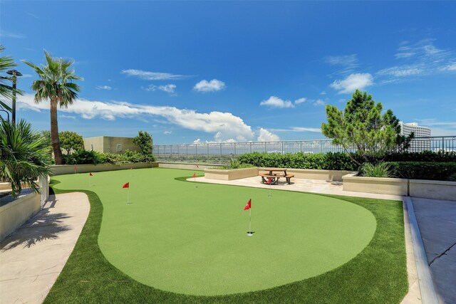 801 E Beach Dr Unit Bc2412, Galveston, TX 77550 - surrounding community with a putting area