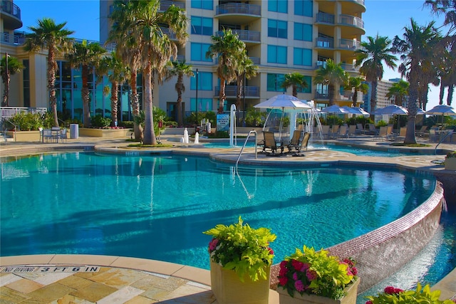 801 E Beach Dr Unit Bc2412, Galveston, TX 77550 - community pool with a patio area