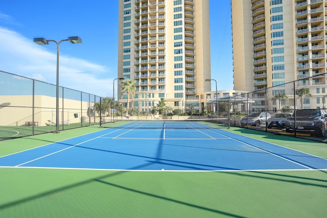 801 E Beach Dr Unit Bc2412, Galveston, TX 77550 - view of tennis court with fence