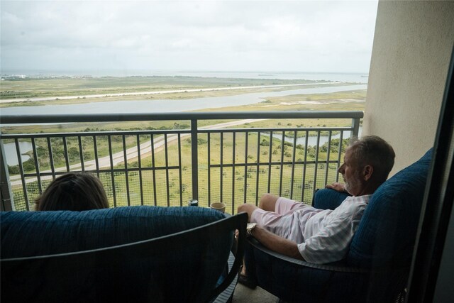 801 E Beach Dr Unit Bc2412, Galveston, TX 77550 - balcony featuring a water view