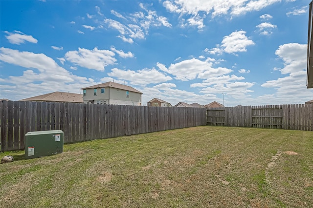 view of yard featuring a fenced backyard