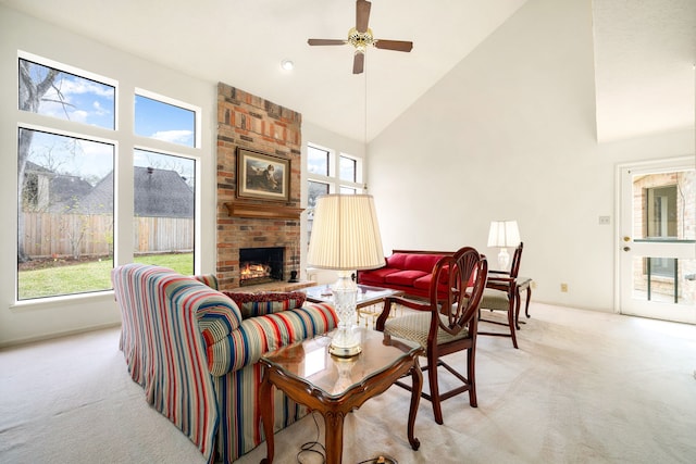 living room featuring light carpet, plenty of natural light, and high vaulted ceiling